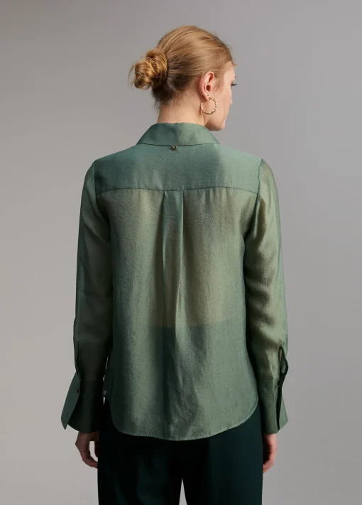 Blusa bolsillos transparencia