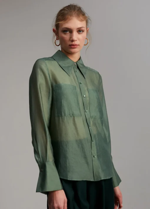 Blusa bolsillos transparencia