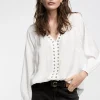 Blusa detalle eyelets