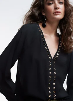 Blusa detalle eyelets