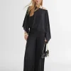 Blusa/capa satinada