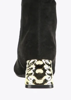 Bota caña alta con tacón dorado