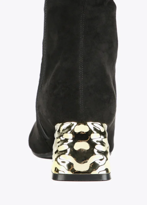 Bota caña alta con tacón dorado