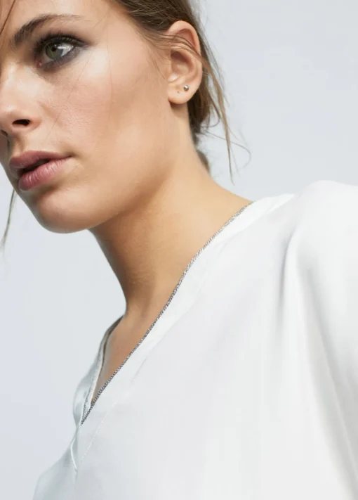 Camiseta detalle cadena