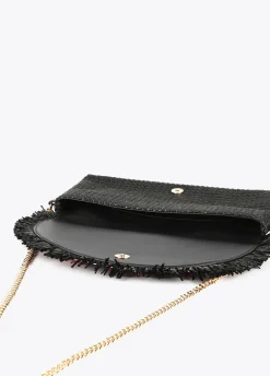 Cartera de mano con piedras de color