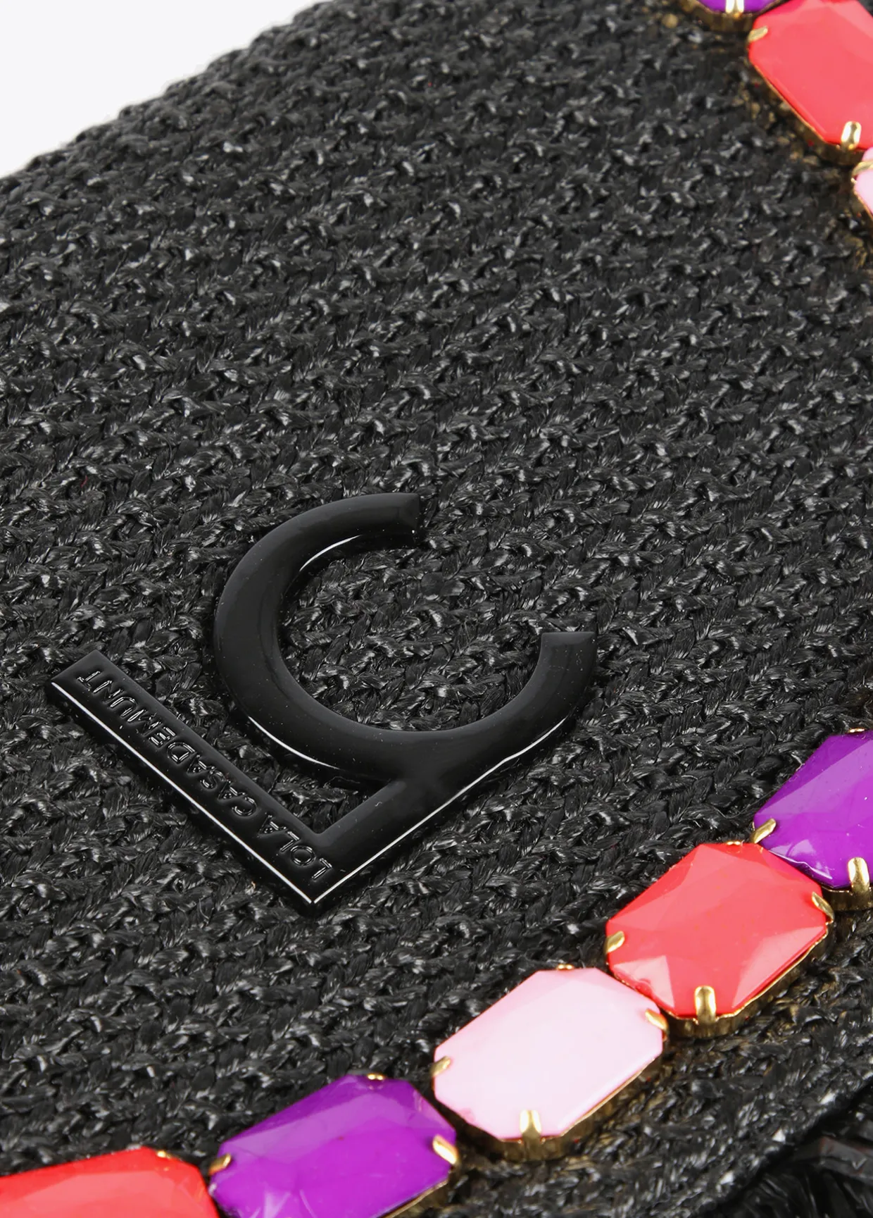 Cartera de mano con piedras de color