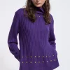 Jersey cuello alto con tachas
