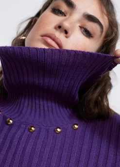 Jersey cuello alto con tachas