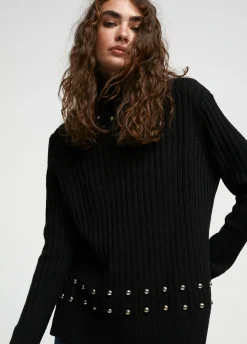 Jersey cuello alto con tachas
