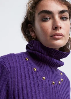 Jersey cuello alto con tachas