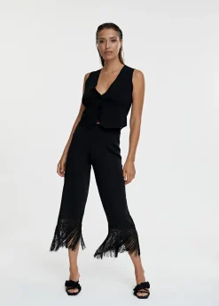 Pantalón punto flecos