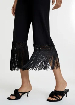 Pantalón punto flecos