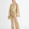 Pantalón recto dorado y tornasolado