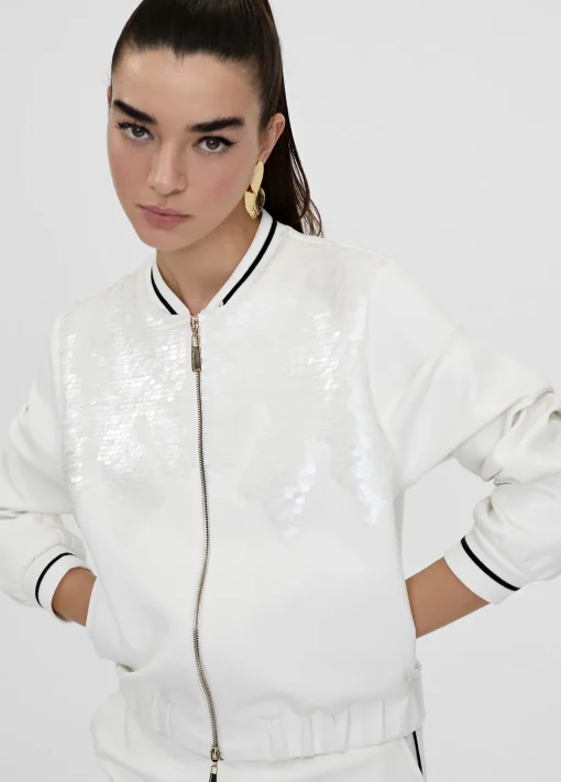 Sudadera cremallera con lentejuelas