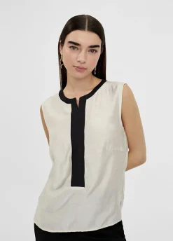 Top bicolor con aberturas