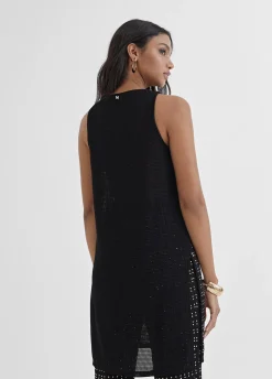 Top largo con piezas metalicas