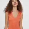 Top punto color liso